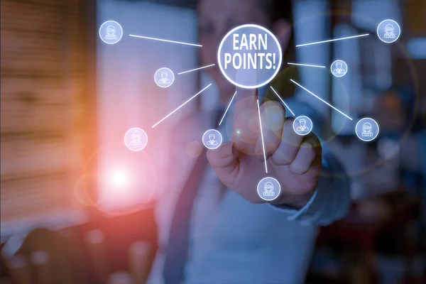 stock image Conceptual hand writing showing Earn Points. Business photo showcasing collecting scores in order qualify to win big prize Woman wear suit presenting presentation using smart device.