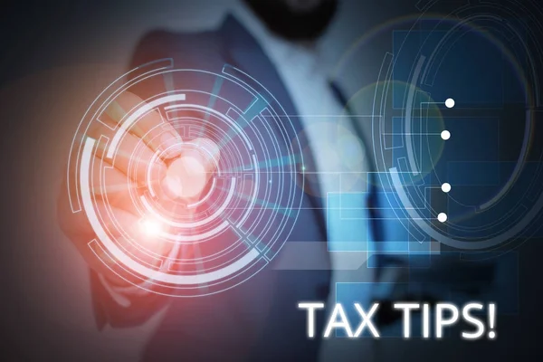 Writing note showing Tax Tips. Business photo showcasing compulsory contribution to state revenue levied by government Male wear formal suit presenting presentation smart device. — Stock Photo, Image
