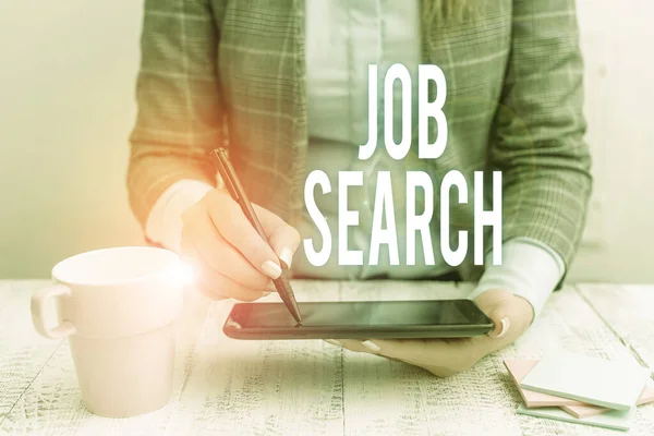 Writing note showing Job Search. Business photo showcasing An act of demonstrating to find work suited for his profession Business woman sitting with mobile phone and cup of coffee on the table. — ストック写真