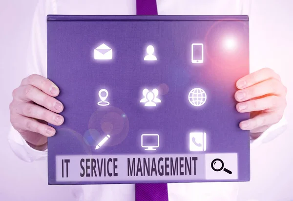 Text sign showing It Service Management. Conceptual photo Activity Directed by Policies Lifecycle of Technology Male human holding thick textured cardboard of business promotion concept.