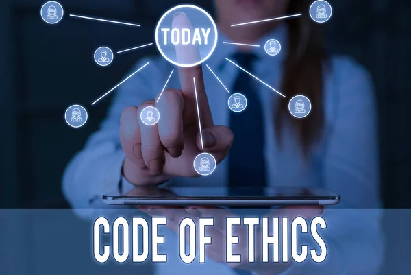 Handwriting text Code Of Ethics. Concept meaning basic guide for professional conduct and imposes duties Woman wear formal work suit presenting presentation using smart device.