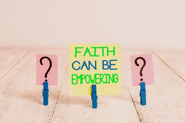 Conceptual hand writing showing Faith Can Be Empowering. Business photo text Trust and Believing in ourselves that we can do it Crumbling sheet with paper clips placed on the wooden table. — Stock Photo, Image