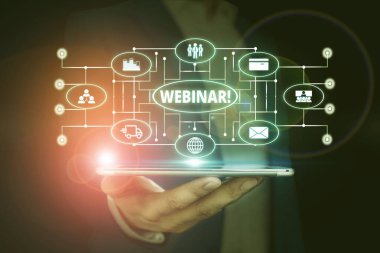 Kelime yazma metni Webinar. Bir seminer ya da başka bir sunum için iş konsepti akıllı aygıt kullanılarak sunulan resmi erkek giyimi.
