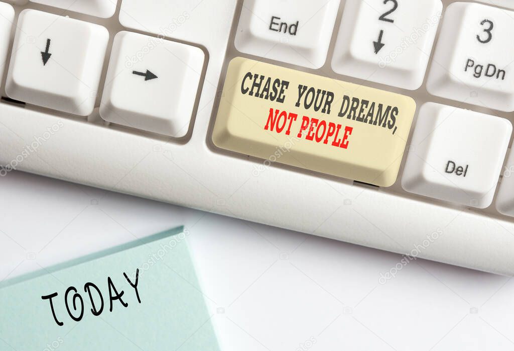 Conceptual hand writing showing Chase Your Dreams Not People. Business photo showcasing Do not follow others chasing goals objectives White pc keyboard with note paper above the white background.