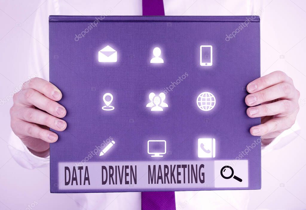 Text sign showing Data Driven Marketing. Conceptual photo Strategy built on Insights Analysis from interactions Male human holding thick textured cardboard of business promotion concept.