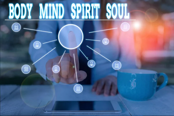 Word writing text Body Mind Spirit Soul. Business concept for Personal Balance Therapy Conciousness state of mind Woman wear formal work suit presenting presentation using smart device. — Stock Photo, Image