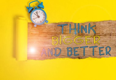 Writing note showing Think Bigger And Better. Business photo showcasing no Limits be Open minded Positivity Big Picture. clipart