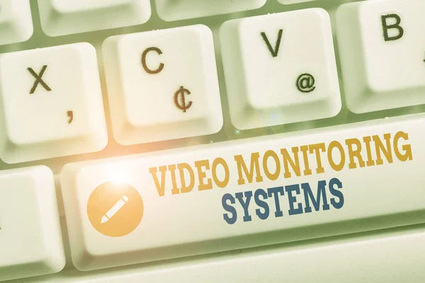 Writing note showing Video Monitoring Systems. Business photo showcasing Surveillance Transmit capture Image to Digital Link Keyboard with note paper on white background key copy space. — Stock Photo, Image