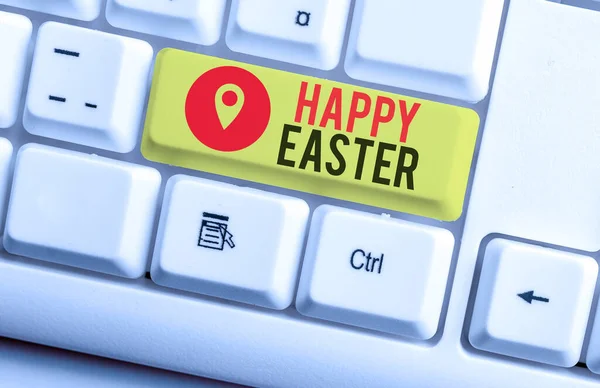 Text sign showing Happy Easter. Conceptual photo the Christian celebration of the Resurrection of Christ White pc keyboard with empty note paper above white background key copy space.