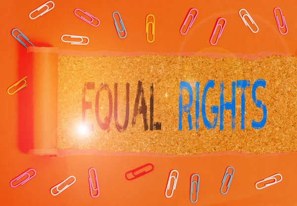 Writing note showing Equal Rights. Business photo showcasing Equality before the law when all showing have the same rights.