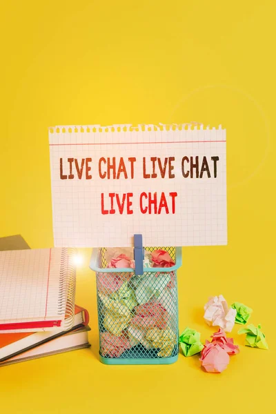 Handwriting text Live Chat Live Chat Live Chat. Concept meaning talking with showing friends relatives online Trash bin crumpled paper clothespin empty reminder office supplies yellow.