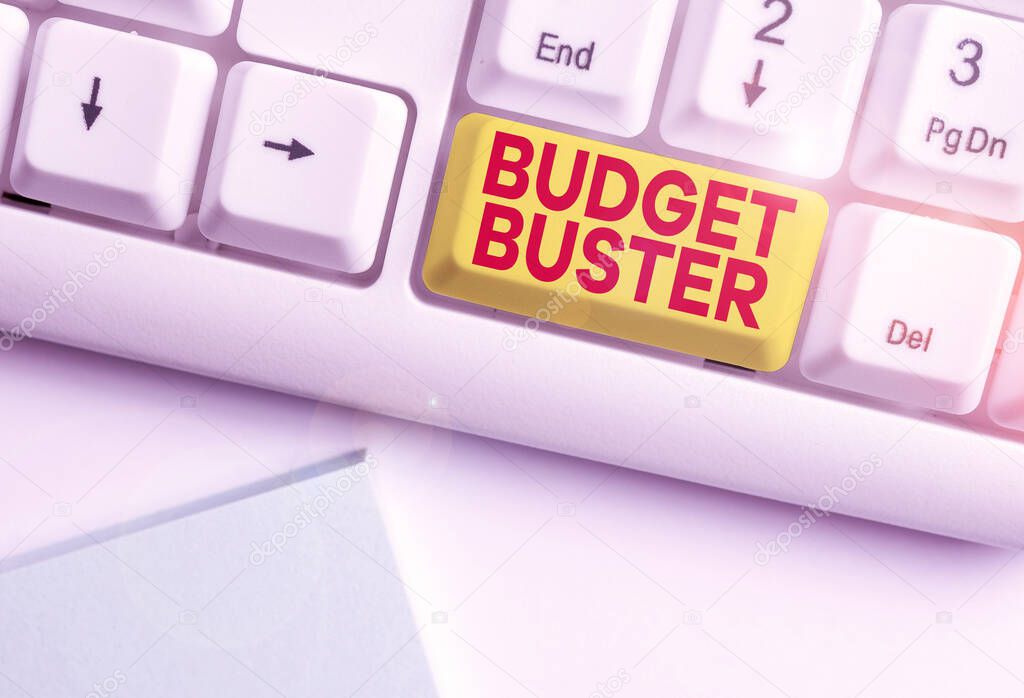 Writing note showing Budget Buster. Business photo showcasing Carefree Spending Bargains Unnecessary Purchases Overspending White pc keyboard with note paper above the white background.