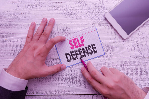 Word writing text Self Defense. Business concept for the act of defending one s is demonstrating when physically attacked.