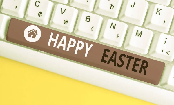 Writing note showing Happy Easter. Business photo showcasing the Christian celebration of the Resurrection of Christ White pc keyboard with note paper above the white background.