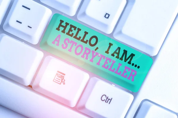 Handwriting text writing Hello I Am A Storyteller. Concept meaning introducing yourself as novels article writer White pc keyboard with empty note paper above white background key copy space.