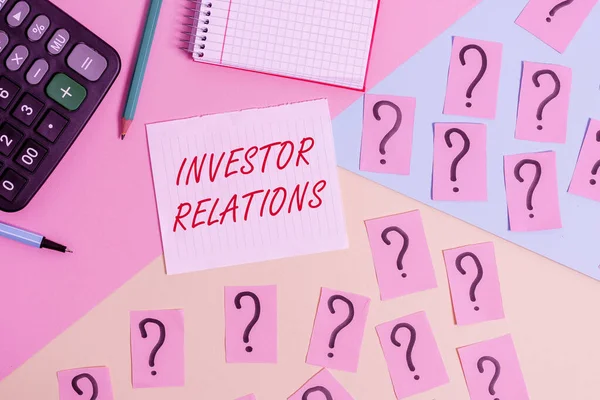 Word writing text Investor Relations. Business concept for analysisagement responsibility that integrates finance Mathematics stuff and writing equipment above pastel colours background.