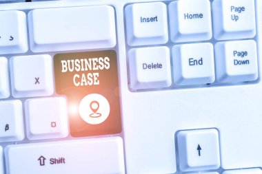 Conceptual hand writing showing Business Case. Business photo text Proposition Undertaking Verbal Presentation New Task White pc keyboard with note paper above the white background.