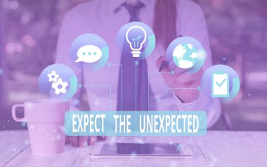 Text sign showing Expect The Unexpected. Conceptual photo Anything can Happen Consider all Possible Events Female human wear formal work suit presenting presentation use smart device.