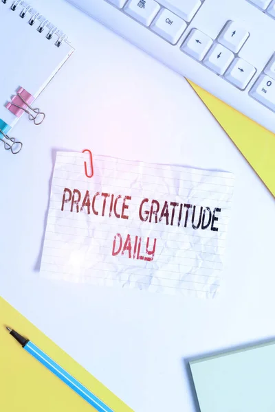 Word writing text Practice Gratitude Daily. Business concept for be grateful to those who helped encouarged you Flat lay above table with pc keyboard and copy space paper for text messages. — ストック写真