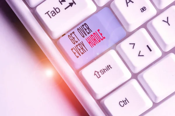 Writing note showing Get Over Every Hurdle. Business photo showcasing Overcome any obstacle problem trouble adversities White pc keyboard with note paper above the white background.