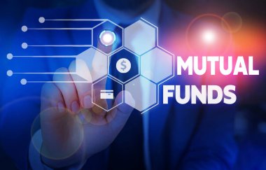 Conceptual hand writing showing Mutual Funds. Business photo text collection of stocks bonds or other securities from investors Male wear formal suit presenting presentation smart device.