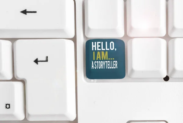 Conceptual hand writing showing Hello I Am A Storyteller. Business photo showcasing introducing yourself as novels article writer White pc keyboard with note paper above the white background. — ストック写真