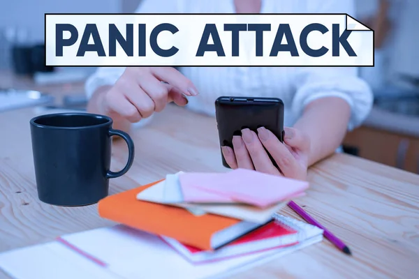 Handwriting text Panic Attack. Concept meaning sudden periods of intense fear that may include palpitations woman using smartphone office supplies technological devices inside home. — 스톡 사진
