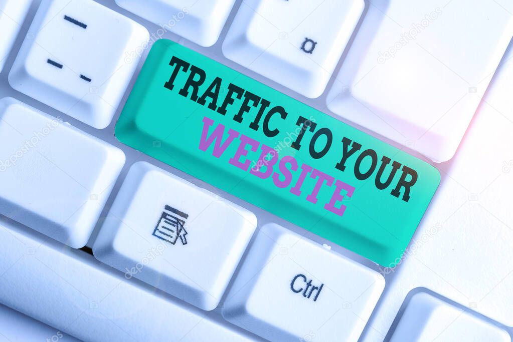 Handwriting text writing Traffic To Your Website. Concept meaning Lifeblood of online business more Potential Leads White pc keyboard with empty note paper above white background key copy space.