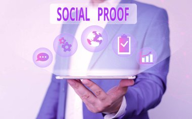 Handwriting text writing Social Proof. Concept meaning informational social influence Psychological Social phenomenon Male human wear formal work suit presenting presentation using smart device.