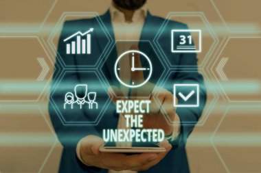 Text sign showing Expect The Unexpected. Conceptual photo Anything can Happen Consider all Possible Events Male human wear formal work suit presenting presentation using smart device.