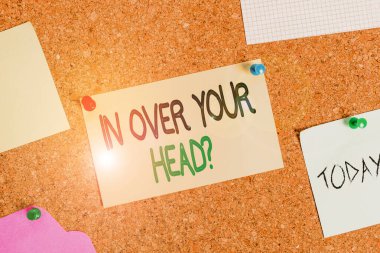 Writing note showing In Over Your Head Question. Business photo showcasing To be involved in a difficult situation problem Corkboard size paper thumbtack sheet billboard notice board.