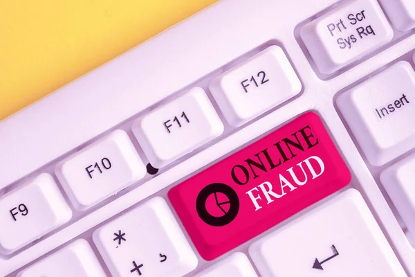 Text sign showing Online Fraud. Conceptual photo use of Internet services to deceive victims and steal money White pc keyboard with empty note paper above white background key copy space. — Stok Foto