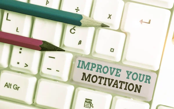 Handwriting text Improve Your Motivation. Concept meaning Boost your self drive Enhance Motives and Goals White pc keyboard with empty note paper above white background key copy space. — Stok fotoğraf
