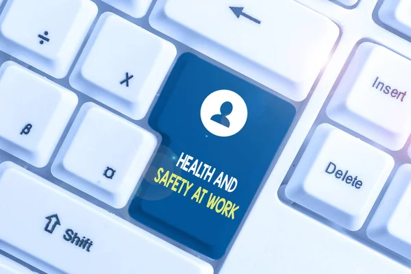 Text sign showing Health And Safety At Work. Conceptual photo Secure procedures prevent accidents avoid danger White pc keyboard with empty note paper above white background key copy space.