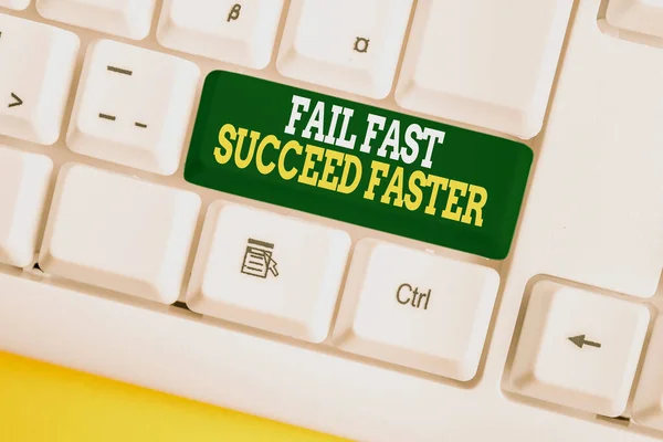 Writing note showing Fail Fast Succeed Faster. Business photo showcasing dont give up keep working on it to achieve White pc keyboard with note paper above the white background.