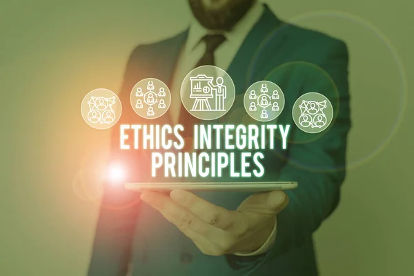 Handwriting text writing Ethics Integrity Principles. Concept meaning quality of being honest and having strong moral Male human wear formal work suit presenting presentation using smart device. — ストック写真