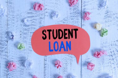 Conceptual hand writing showing Student Loan. Business photo text financial assistance designed to help students pay for school Colored speech bubble paper balls wooden rustic vintage background. clipart