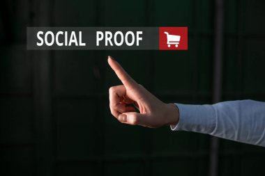 Kelime yazma sosyal kanıtı. Bilgilendirici sosyal etki için iş konsepti Psikolojik Sosyal fenomen Parmaklama Karanlık 'ı işaret ederek fotokopi alanını işaret ederek.
