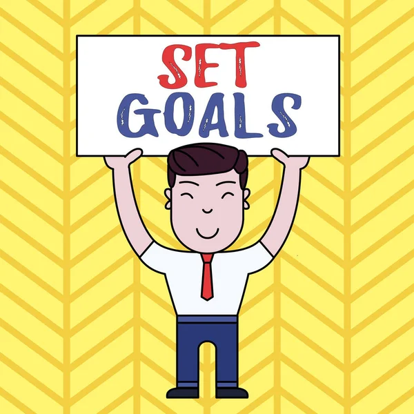 Text sign showing Set Goals. Conceptual photo Defining or achieving something in the future based on plan Smiling Man Standing Holding Big Empty Placard Overhead with Both Hands. — Stock Photo, Image