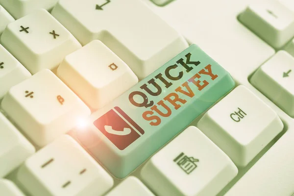 Text sign showing Quick Survey. Conceptual photo questionnaire that the target audience can complete right away White pc keyboard with empty note paper above white background key copy space. — Stock Photo, Image