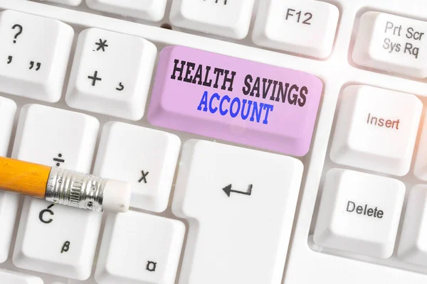 Word writing text Health Savings Account. Business concept for users with High Deductible Health Insurance Policy White pc keyboard with empty note paper above white background key copy space.
