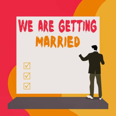 Kavramsal el yazısı evlendiğimizi gösteriyor. İş fotoğrafı metni. Nişan hazırlığı. Sevgili çift. Arkaya bakan genç bayan boş büyük dikdörtgen izliyor..