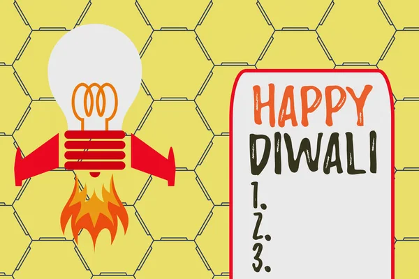 Woord schrijven tekst Happy Diwali. Zakelijk concept voor festival van licht dat wordt gevierd door miljoenen Hindoes Top view lanceren gloeilamp vuurbasis. Start nieuw project. Brandstofidee. — Stockfoto