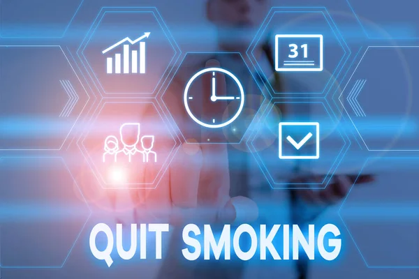 Conceptual hand writing showing Quit Smoking. Business photo text process of discontinuing tobacco smoking or cessation Woman wear work suit presenting presentation smart device. — Stock Photo, Image