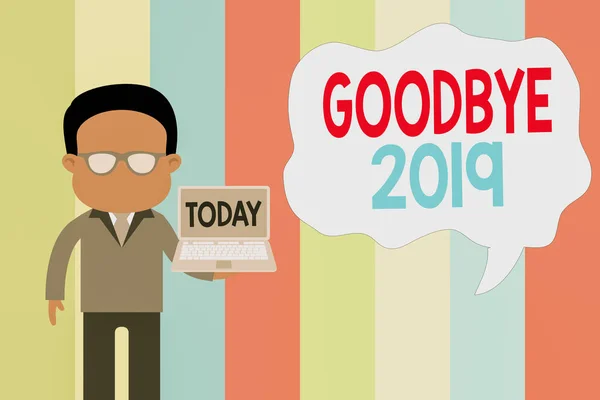 Text sign showing Goodbye 2019. Conceptual photo expressing good wishes during parting at the end of the year Standing man in suit wearing eyeglasses holding open laptop photo Art.