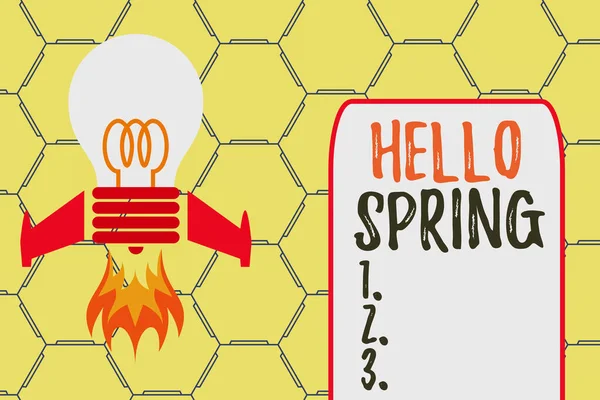 Word writing text Hello Spring. Business concept for welcoming the season of the blossoming of flowers End of winter Top view launching bulb rocket fire base. Starting new project. Fuel idea. — Stock Photo, Image