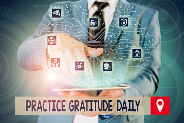 Handwriting text writing Practice Gratitude Daily. Concept meaning be grateful to those who helped encouarged you Male human wear formal work suit presenting presentation using smart device.