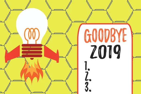 Word writing text Goodbye 2019. Business concept for expressing good wishes during parting at the end of the year Top view launching bulb rocket fire base. Starting new project. Fuel idea.