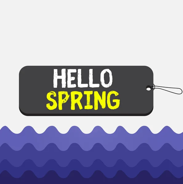 Conceptual hand writing showing Hello Spring. Business photo text welcoming the season of the blossoming of flowers End of winter Label tag badge rectangle shaped string colorful background. — Stock Photo, Image