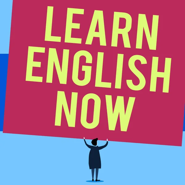 Writing note showing Learn English Now. Business photo showcasing gain or acquire knowledge and skill of english language Short hair woman standing dress hands up holding blank rectangle. — Stok fotoğraf
